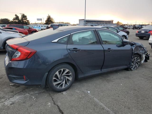 Photo 3 from auction – 2018 HONDA CIVIC EX with VIN 19XFC2F72JE017165