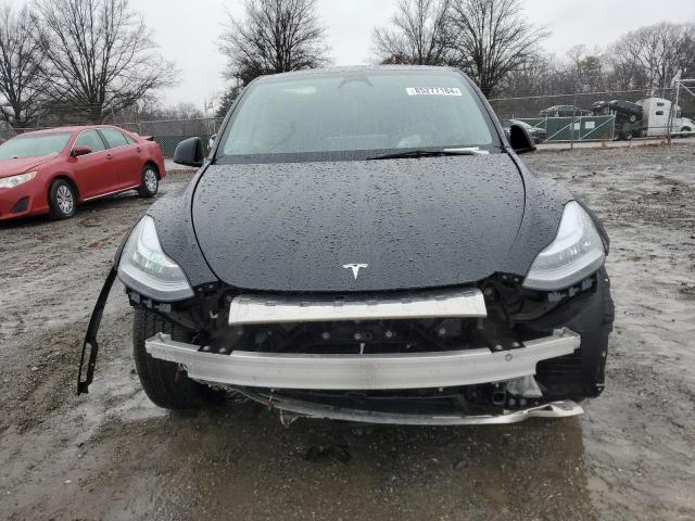 Photo 5 from auction – 2023 TESLA MODEL Y with VIN 7SAYGDEE1PA151757