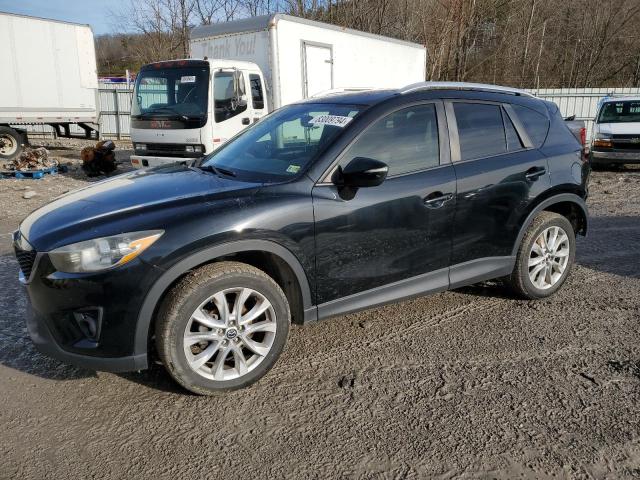MAZDA CX-5 GT 2015 with VIN JM3KE4DY0F0538781 - Photo from auction