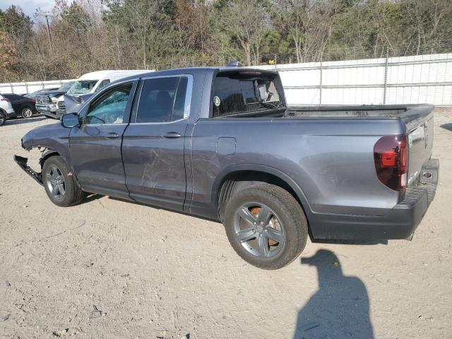Photo 2 from auction – 2023 HONDA RIDGELINE with VIN 5FPYK3F59PB023510