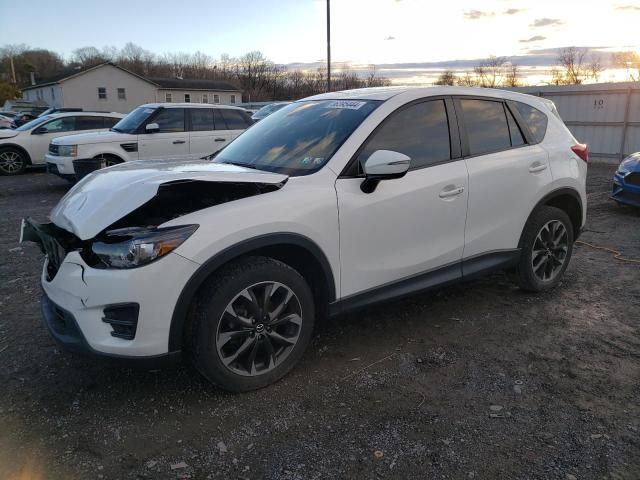 MAZDA CX-5 GT 2016 with VIN JM3KE4DYXG0691945 - Photo from auction