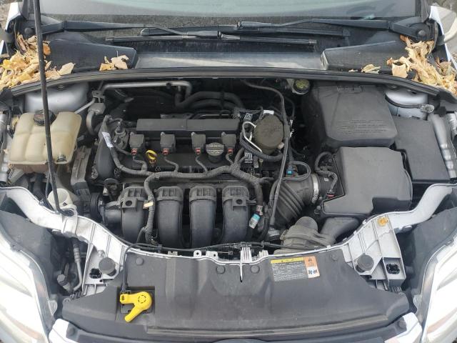 Photo 11 from auction – 2014 FORD FOCUS SE with VIN 1FADP3F23EL209350