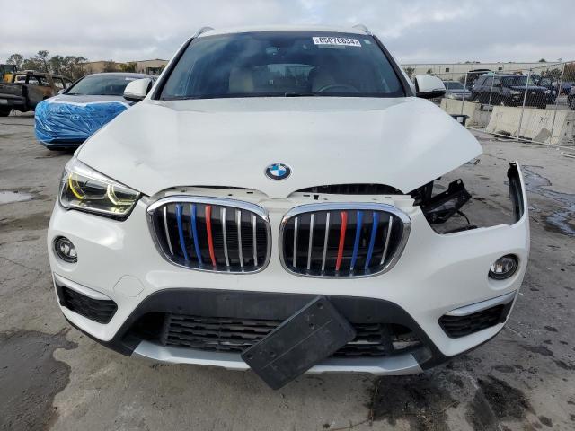 Photo 5 from auction – 2016 BMW X1 XDRIVE2 with VIN WBXHT3C35G5F64442