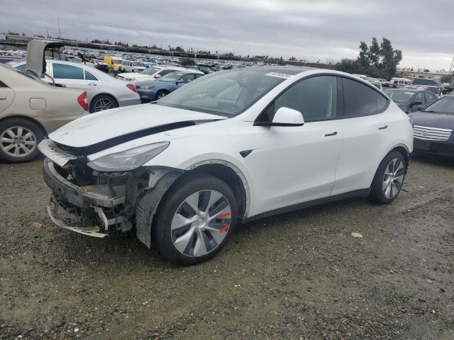TESLA MODEL Y 2023 с VIN 7SAYGAEE4PF881101 - Фото с аукциона