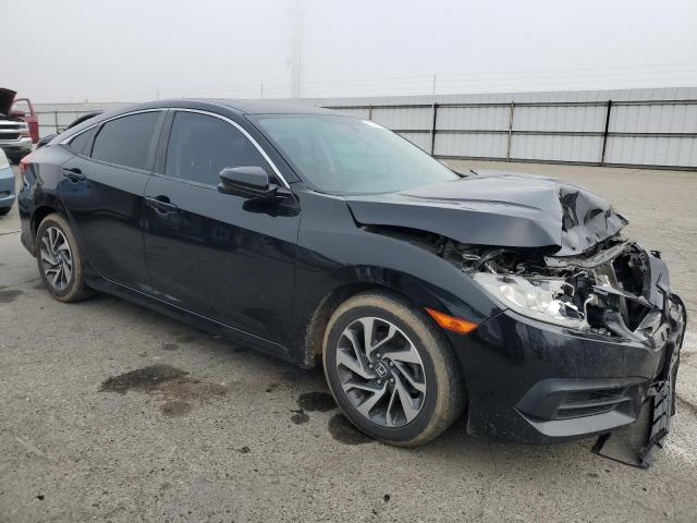 Photo 4 from auction – 2018 HONDA CIVIC EX with VIN 2HGFC2F77JH596191