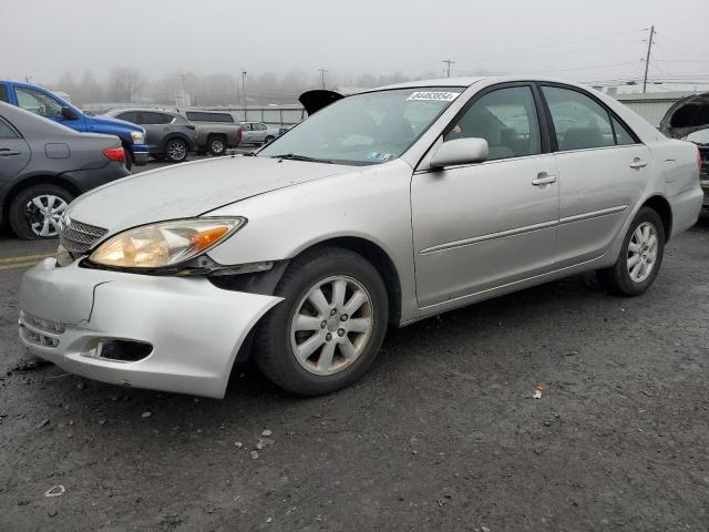 TOYOTA CAMRY LE 2003 with VIN 4T1BE30K03U167786 - Photo from auction