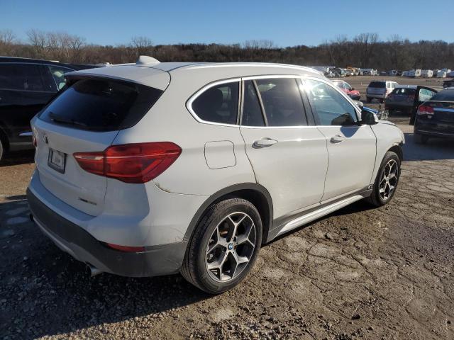 Photo 3 from auction – 2018 BMW X1 XDRIVE2 with VIN WBXHT3C39J5L29286
