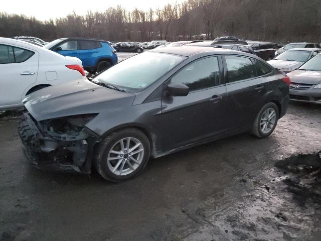 FORD FOCUS SE 2018 with VIN 1FADP3F28JL207474 - Photo from auction