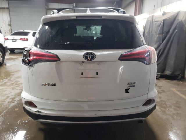 Photo 6 from auction – 2017 TOYOTA RAV4 XLE with VIN JTMRFREV2HD204821