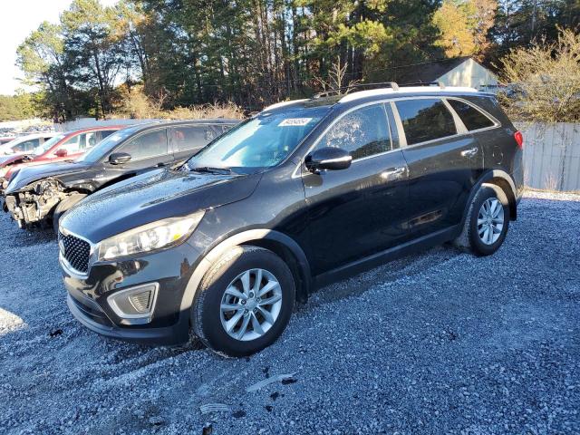 KIA SORENTO LX 2016 with VIN 5XYPG4A56GG109112 - Photo from auction