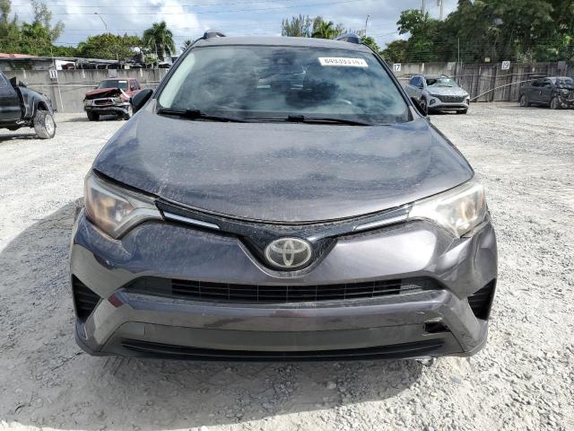 Photo 5 from auction – 2017 TOYOTA RAV4 LE with VIN JTMZFREV9HJ720482