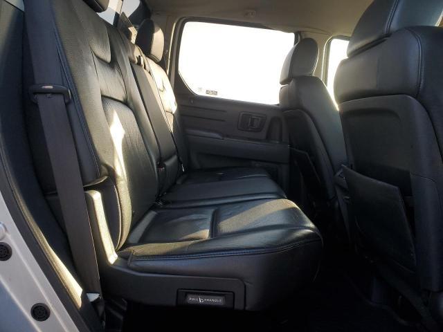 Photo 11 from auction – 2006 HONDA RIDGELINE with VIN 2HJYK16596H513883