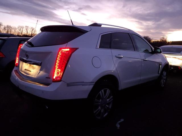 Photo 3 from auction – 2014 CADILLAC SRX LUXURY with VIN 3GYFNEE35ES561493