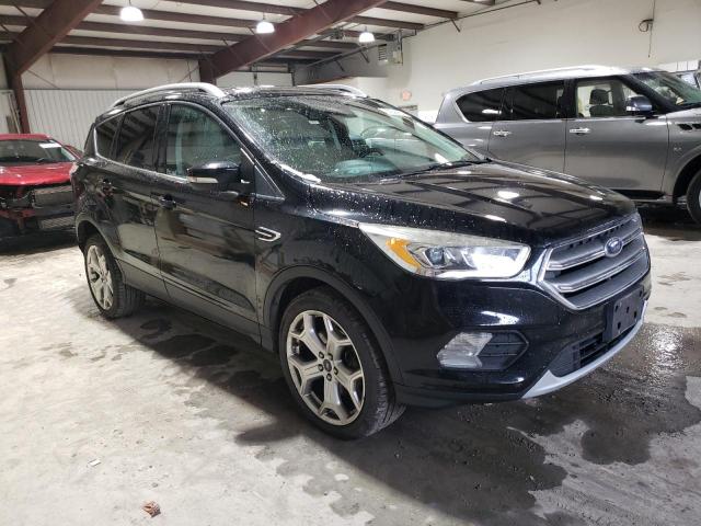 Photo 4 from auction – 2017 FORD ESCAPE TIT with VIN 1FMCU9J98HUF09384