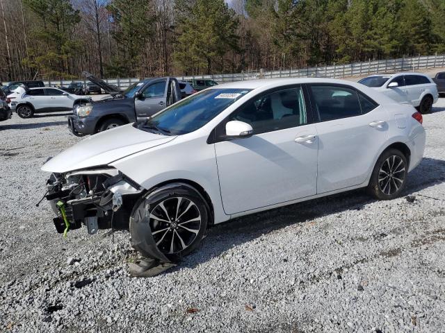 TOYOTA COROLLA L 2017 with VIN 2T1BURHE8HC869237 - Photo from auction
