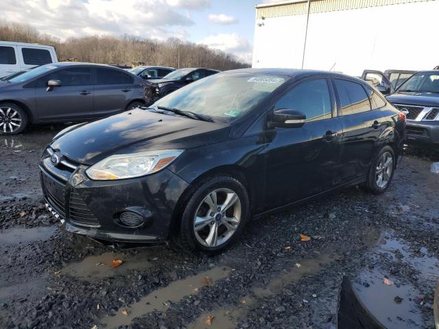 FORD FOCUS SE 2014 with VIN 1FADP3F21EL393123 - Photo from auction