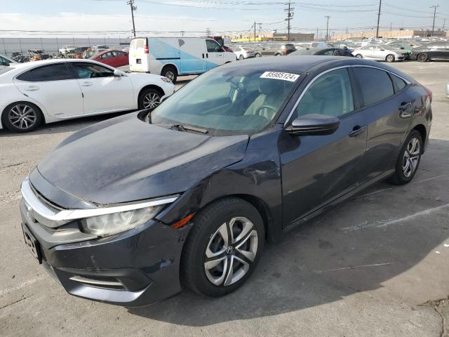 HONDA CIVIC LX 2018 with VIN 2HGFC2F54JH505215 - Photo from auction