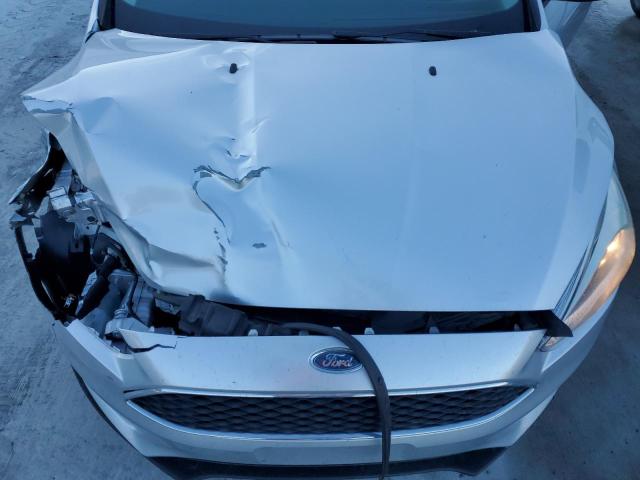 Photo 11 from auction – 2018 FORD FOCUS S with VIN 1FADP3E28JL201711