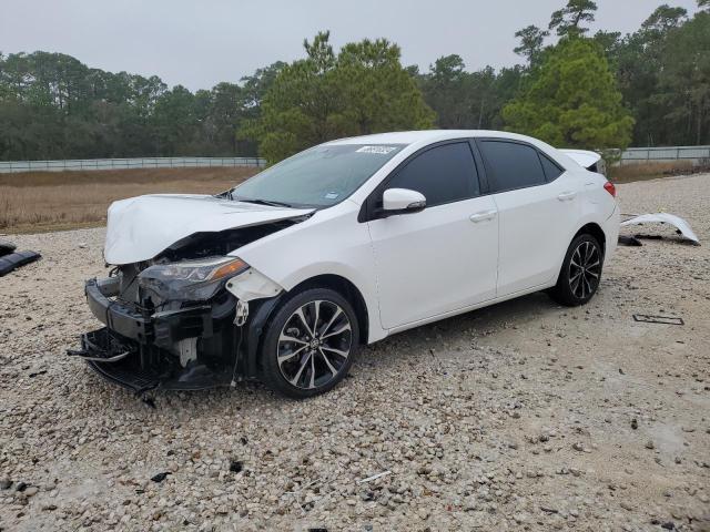 TOYOTA COROLLA L 2018 with VIN 5YFBURHE3JP851802 - Photo from auction