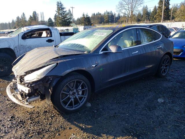 TESLA MODEL 3 2018 with VIN 5YJ3E1EB9JF170696 - Photo from auction