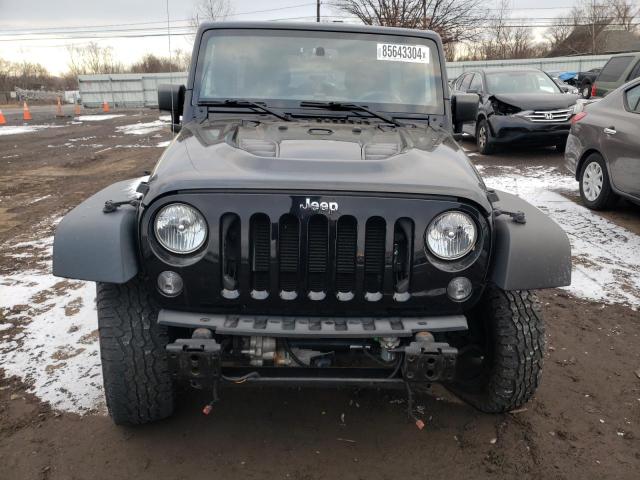 Photo 5 from auction – 2016 JEEP WRANGLER U with VIN 1C4BJWFG1GL240115