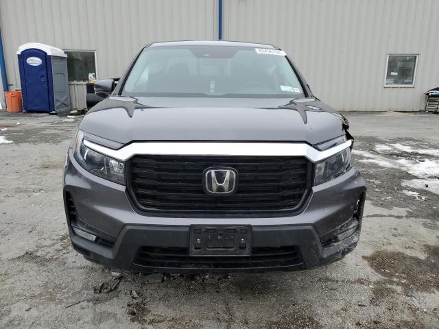 Photo 5 from auction – 2023 HONDA RIDGELINE with VIN 5FPYK3F78PB059609