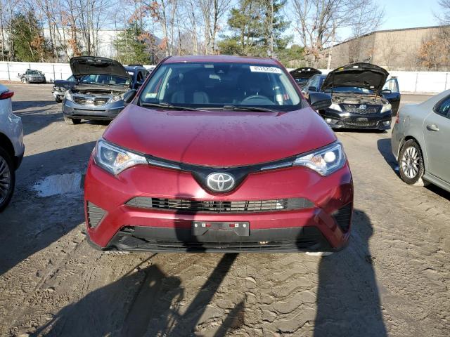 Photo 5 from auction – 2018 TOYOTA RAV4 LE with VIN 2T3BFREV6JW770037