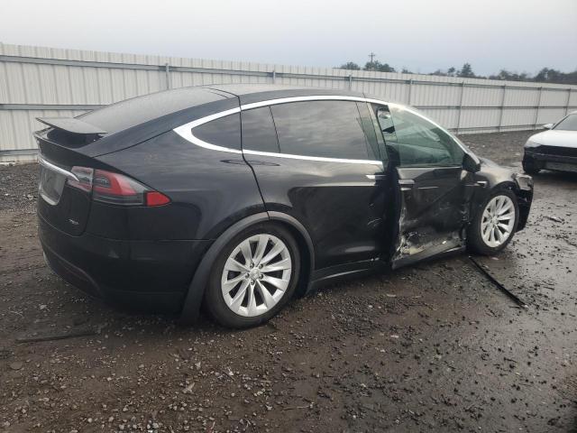 Photo 3 from auction – 2017 TESLA MODEL X with VIN 5YJXCDE2XHF049355