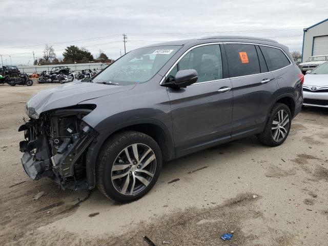 HONDA PILOT ELIT 2017 with VIN 5FNYF6H02HB074512 - Photo from auction