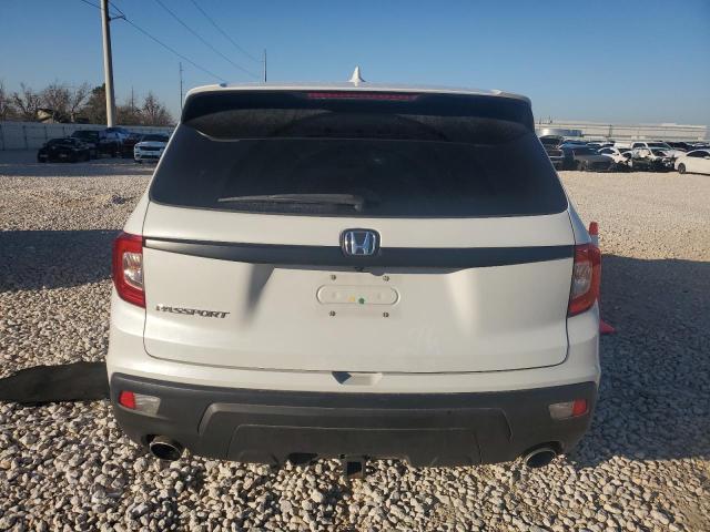 Photo 6 from auction – 2021 HONDA PASSPORT E with VIN 5FNYF7H56MB015412