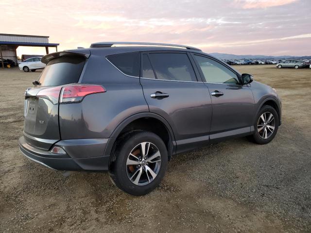 Photo 3 from auction – 2017 TOYOTA RAV4 XLE with VIN JTMWFREV7HD107990
