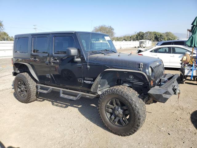Photo 4 from auction – 2011 JEEP WRANGLER U with VIN 1J4BA3H17BL565796