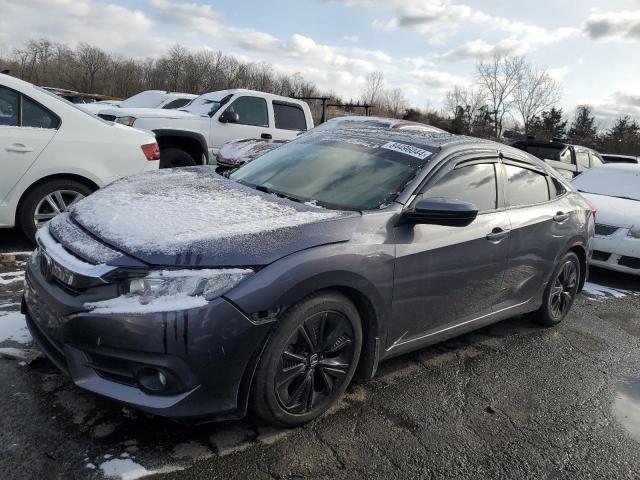 HONDA CIVIC EX 2017 with VIN 19XFC1F35HE000720 - Photo from auction