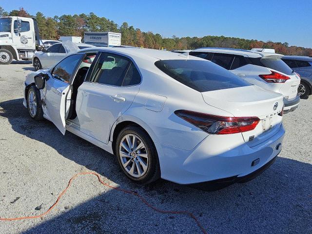 Photo 2 from auction – 2022 TOYOTA CAMRY LE with VIN 4T1C11AK0NU662995