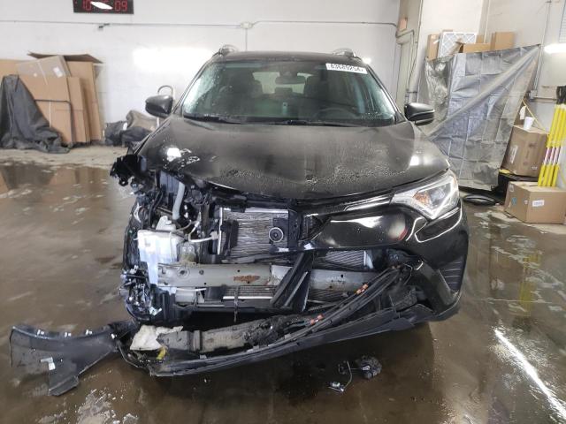 Photo 5 from auction – 2018 TOYOTA RAV4 LE with VIN 2T3BFREV7JW732428
