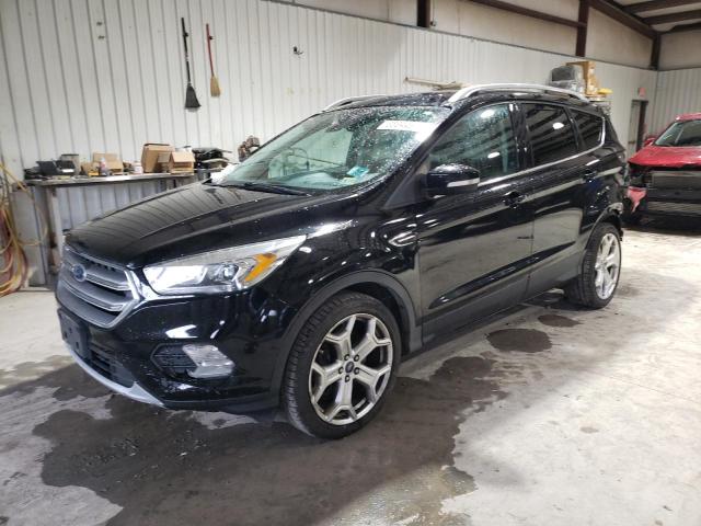 FORD ESCAPE TIT 2017 with VIN 1FMCU9J98HUF09384 - Photo from auction