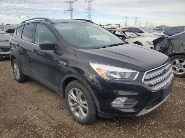 Photo 4 from auction – 2018 FORD ESCAPE SE with VIN 1FMCU0GD4JUC45710