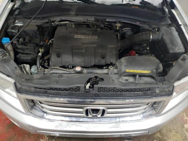 Photo 11 from auction – 2013 HONDA RIDGELINE with VIN 5FPYK1F50DB008426