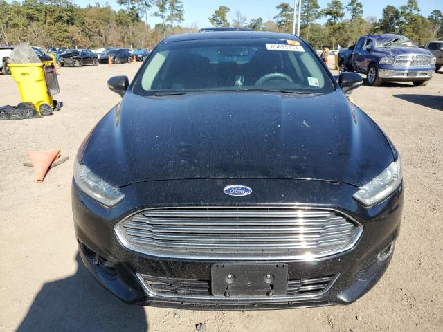 Photo 5 from auction – 2016 FORD FUSION TIT with VIN 3FA6P0K90GR331940