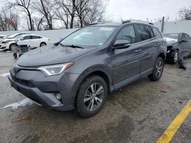 TOYOTA RAV4 XLE 2017 with VIN 2T3RFREV8HW649647 - Photo from auction