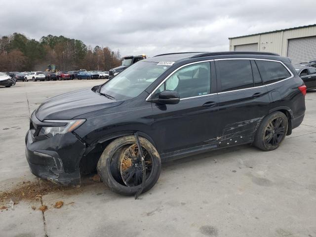 HONDA PILOT SE 2022 with VIN 5FNYF5H27NB027015 - Photo from auction