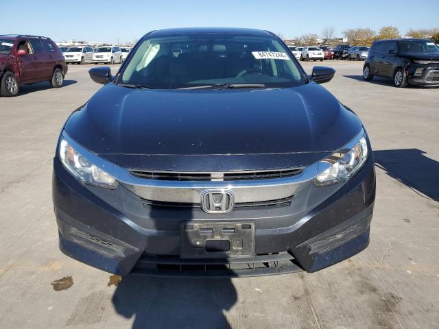 Photo 5 from auction – 2017 HONDA CIVIC LX with VIN 19XFC2F5XHE063352