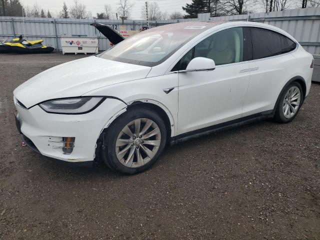 TESLA MODEL X 2017 with VIN 5YJXCBE20HF042158 - Photo from auction