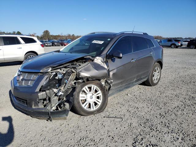 CADILLAC SRX 2011 with VIN 3GYFNAEY4BS664498 - Photo from auction