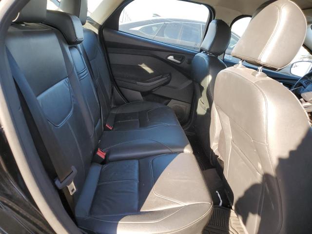 Photo 10 from auction – 2015 FORD FOCUS TITA with VIN 1FADP3N23FL249138