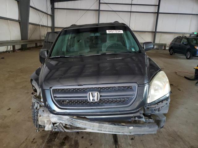 Photo 5 from auction – 2004 HONDA PILOT EX with VIN 2HKYF18434H540420