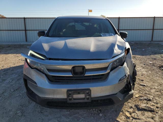 Photo 5 from auction – 2020 HONDA PILOT LX with VIN 5FNYF5H15LB027051