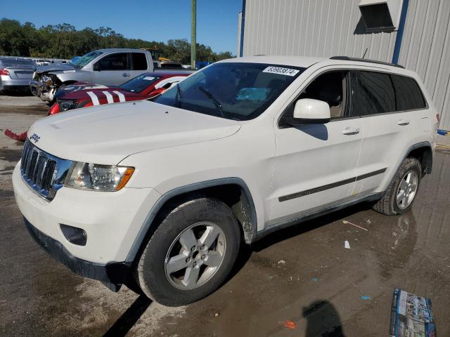 JEEP GRAND CHER 2011 with VIN 1J4RS4GG0BC719868 - Photo from auction