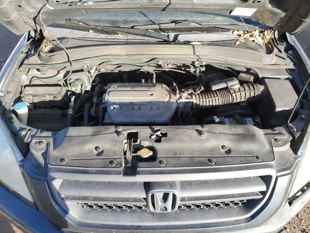 Photo 12 from auction – 2005 HONDA PILOT EX with VIN 2HKYF18495H520951