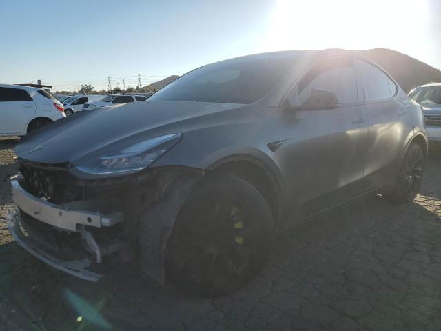 TESLA MODEL Y 2022 with VIN 7SAYGDEE3NF322105 - Photo from auction